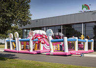 Handlowy nadmuchiwany park rozrywki Plato PVC 10m różowy Candyland ze zjeżdżalnią